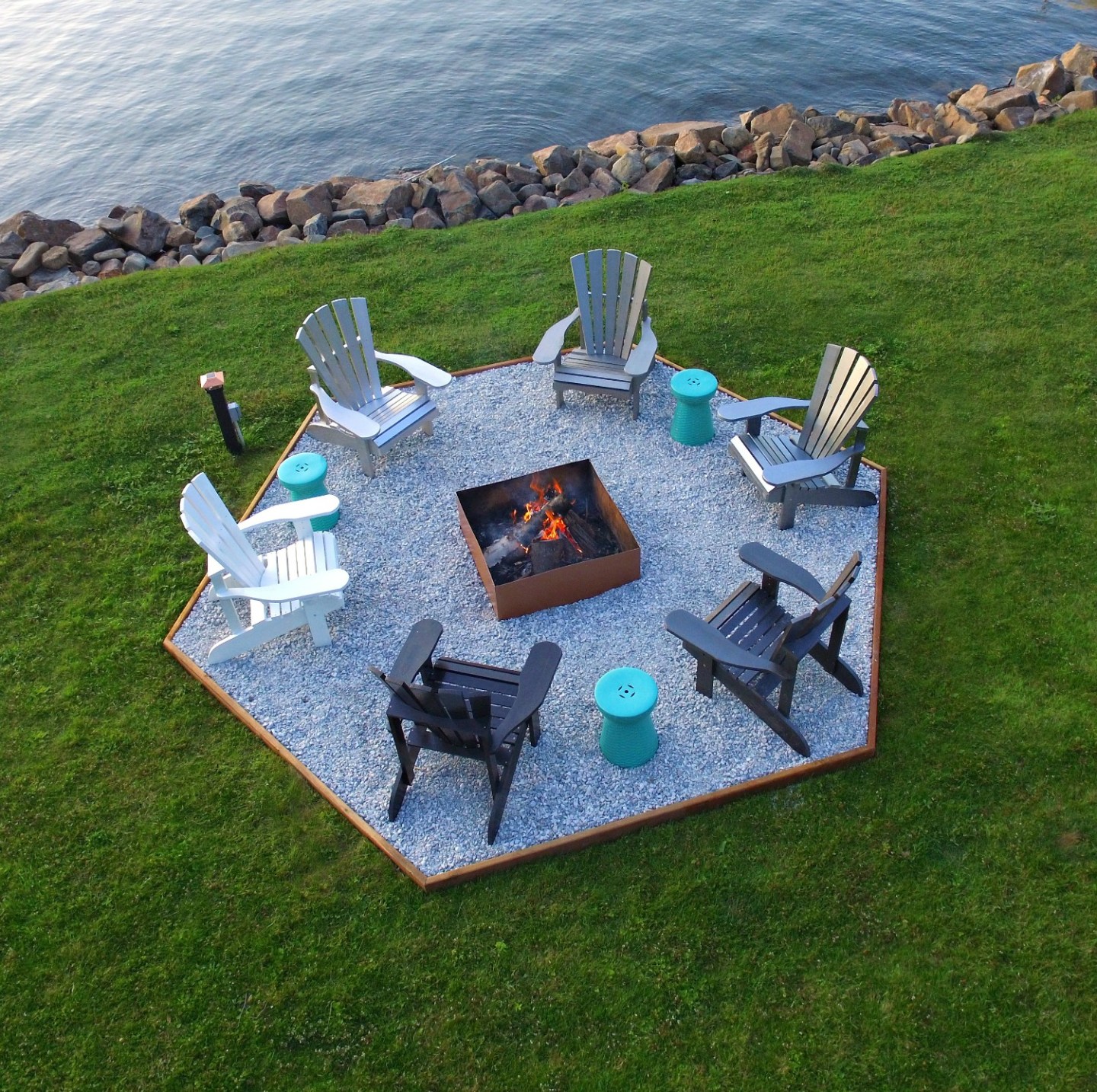 Adirondack chairs by a fire pit