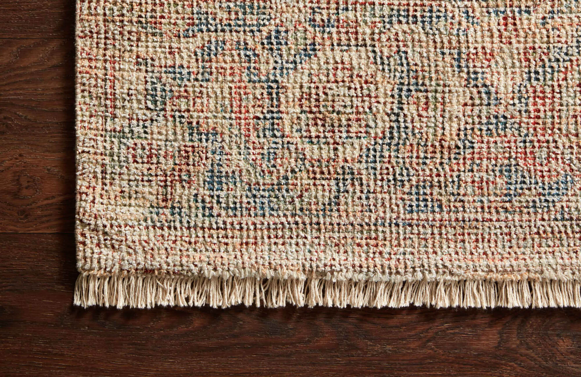 Close-up of colorful woven flat-weave rug texture