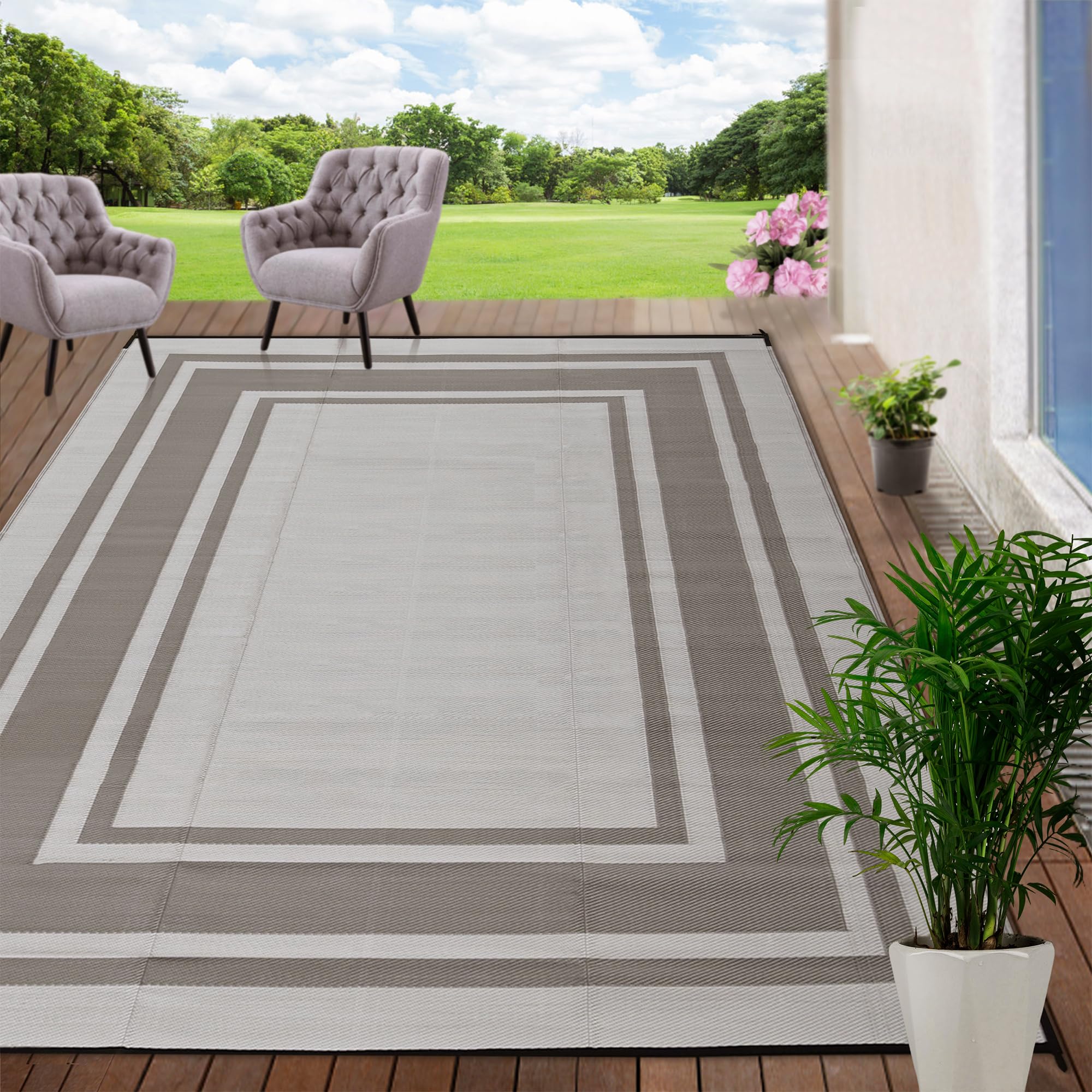 Large rug on a spacious decorated outdoor patio