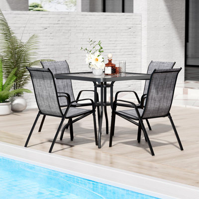Metal outdoor dining set on a patio