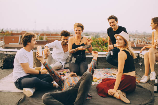 Outdoor patio party with friends enjoying music