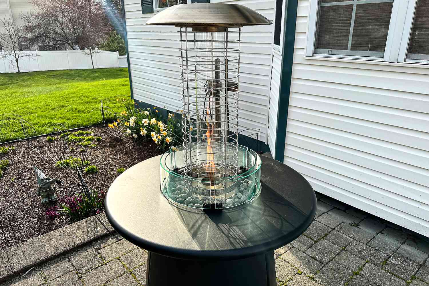Propane fire table in an outdoor setting