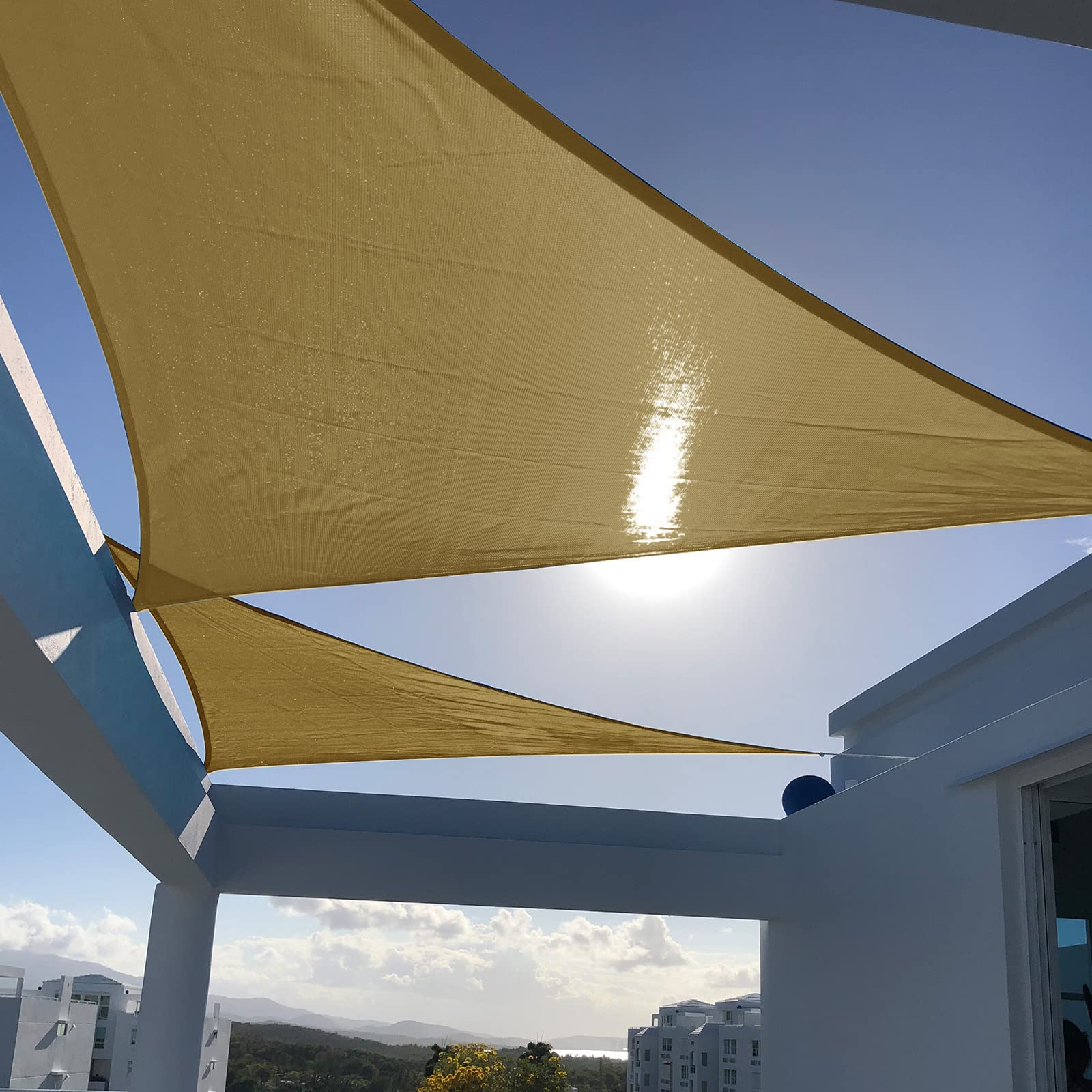 Shade sail triangle over a patio