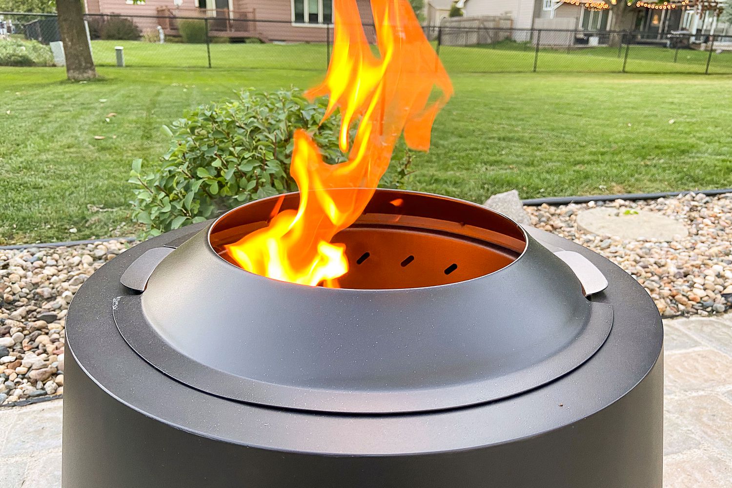 Small smokeless fire pit in a backyard