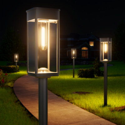 Solar path lights lining a garden walkway