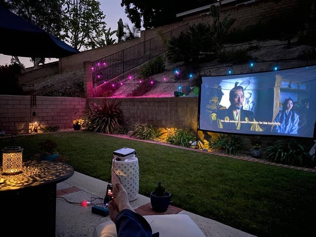 Outdoor Projector vs Outdoor TV: Which Wins?